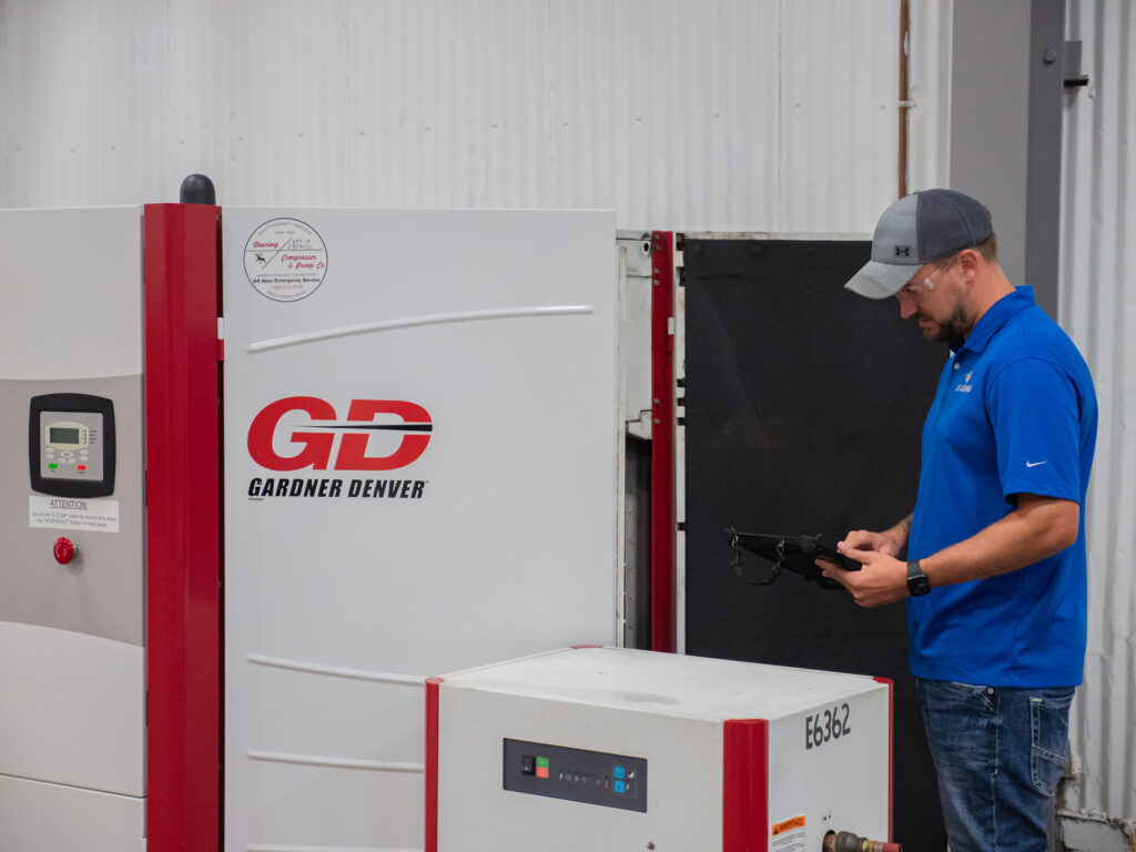 dearing compressor employee getting the most out of his compressor with consistent maintenance