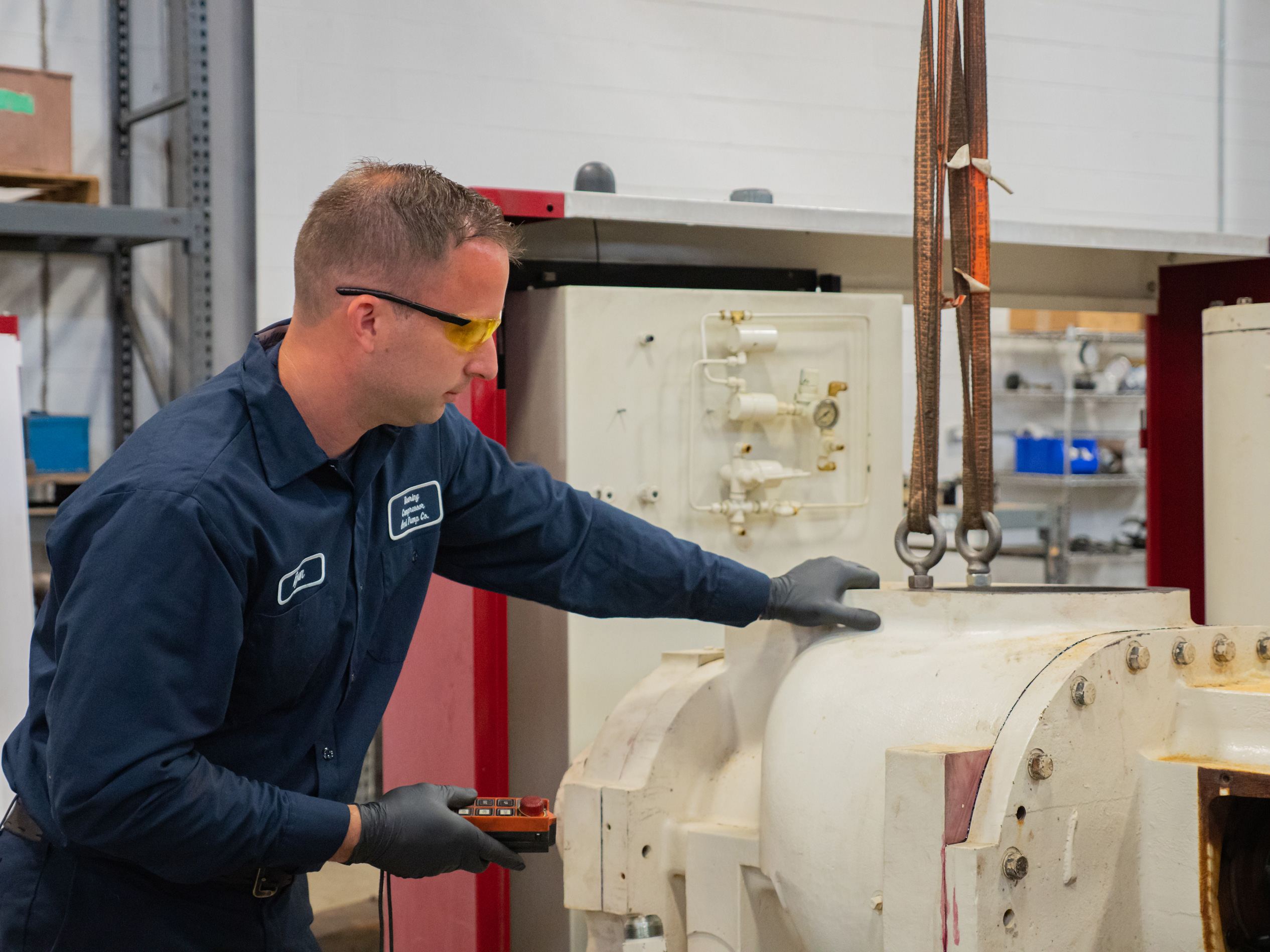 Dearing Compressor employee checking levels for compressor project